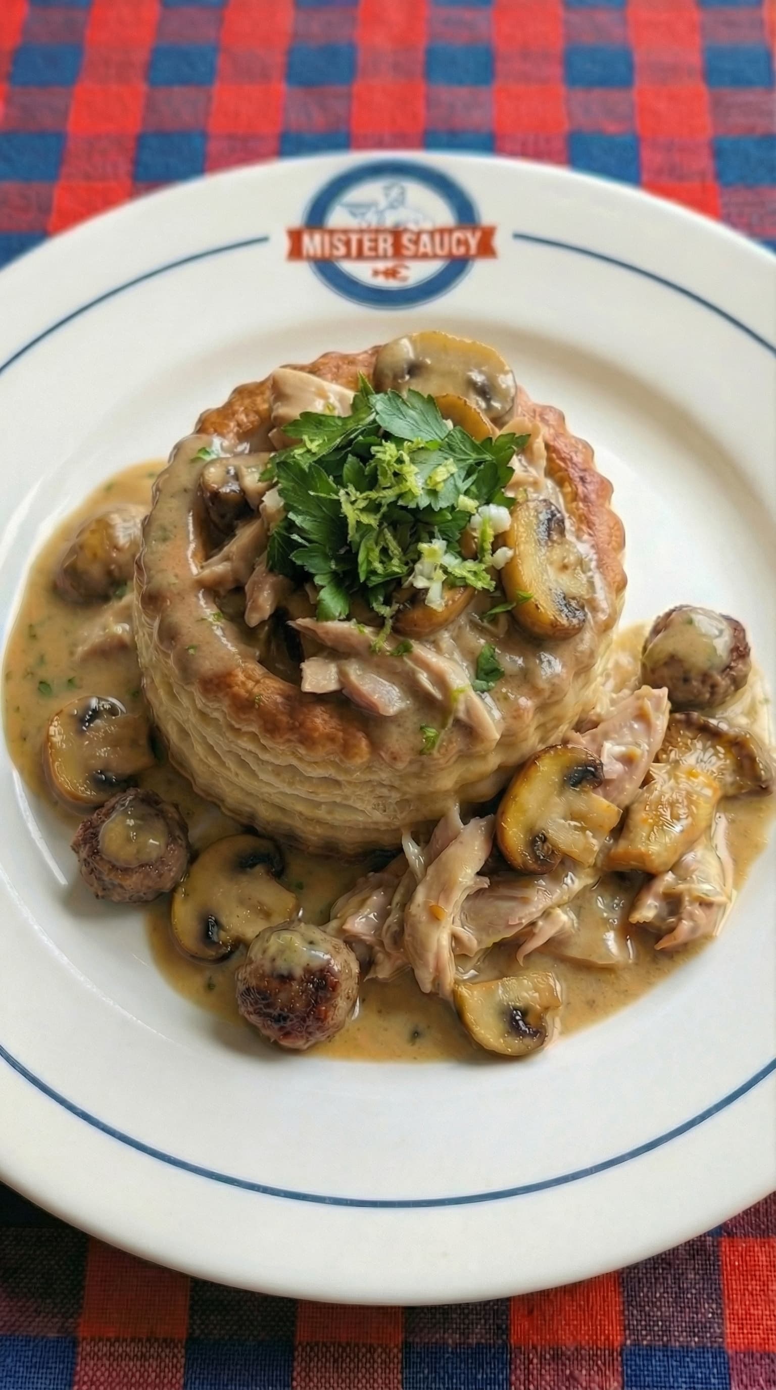 Adobo-Inspired Chicken Vol-au-Vent with Ginger, Cognac, Lemon-Garlic Gremolata and Seared Meatballs